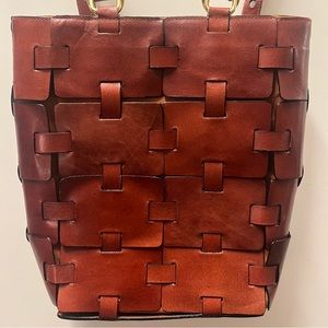 Vintage pieced leather backpack, cognac and marigold